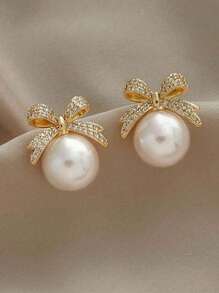 1 paire de boucles d'oreilles élégantes en nœud papillon pour femmes, boucles d'oreilles minimalistes à la mode avec perles et strass, convenant pour le port quotidien, les festivals et les mariages