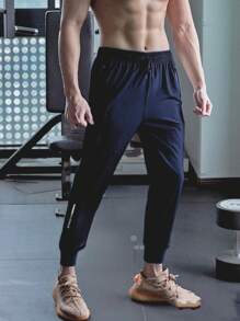 Pantaloni sportivi casual leggeri da uomo, in tessuto serico elastico e ad asciugatura rapida, adatti per l'estate