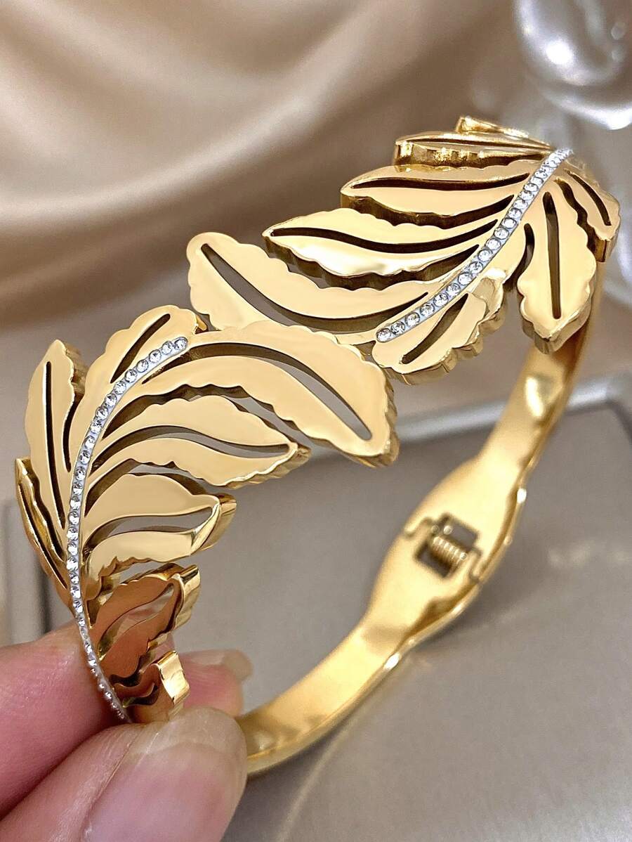 1 pièce Bracelet épais ajouré en forme de feuille pour femmes, bracelet jonc doré en acier inoxydable. Bracelets pour usage quotidien, fête, anniversaire, Noël, cadeaux de bijoux