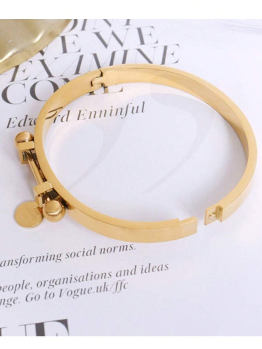 A stainless steel women's party dating work INS style criss cross smooth open bracelet - Yellow Gold - View 1