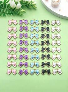 10 pièces Charmes de nœud en émail, pendentifs de nœuds papillon de couleurs assorties, mini nœuds papillon mignons pour artisanat DIY, bracelets, colliers, boucles d'oreilles, accessoires de bijouterie
