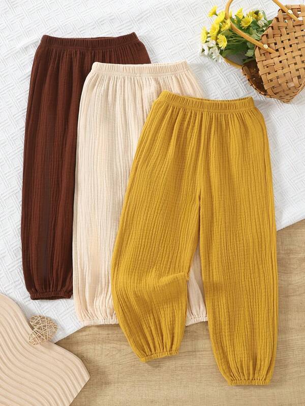 3 piezas Pantalones de verano casuales para niñas, en colores amarillo, marrón y albaricoque, apropiados para uso al aire libre