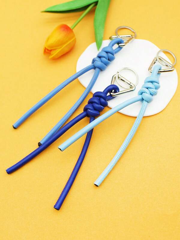 1 قطعة سلسلة مفاتيح جلدية محبوكة بشكل عقدة بسيط وعصري، حلقة مفاتيح أحادية اللون عملية وعصرية، إكسسوار يومي متعدد الاستخدامات للحقائب والسيارات والحقائب المدرسية والحقائب الجوتية والحقائب Y2K، مع حامل بطاقة هوية