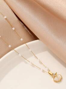 1 pieza Collar de cadena con perlas de color dorado y decoración de rhinestone con colgante minimalista de concha pequeña y estrella de mar para mujer