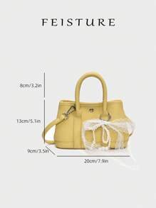 1 件 FEISTURE 荔枝纹理大号和小号女士水桶手提包，春季时尚手提包，带可拆卸肩带，附赠蝴蝶吊饰作为免费礼物，适合女孩、女士、大学生、职场新人和办公室职员，非常适合工作、商务、通勤和上学 - 黃色 - 查看 5