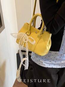 1 件 FEISTURE 荔枝纹理大号和小号女士水桶手提包，春季时尚手提包，带可拆卸肩带，附赠蝴蝶吊饰作为免费礼物，适合女孩、女士、大学生、职场新人和办公室职员，非常适合工作、商务、通勤和上学 - 黃色 - 查看 11