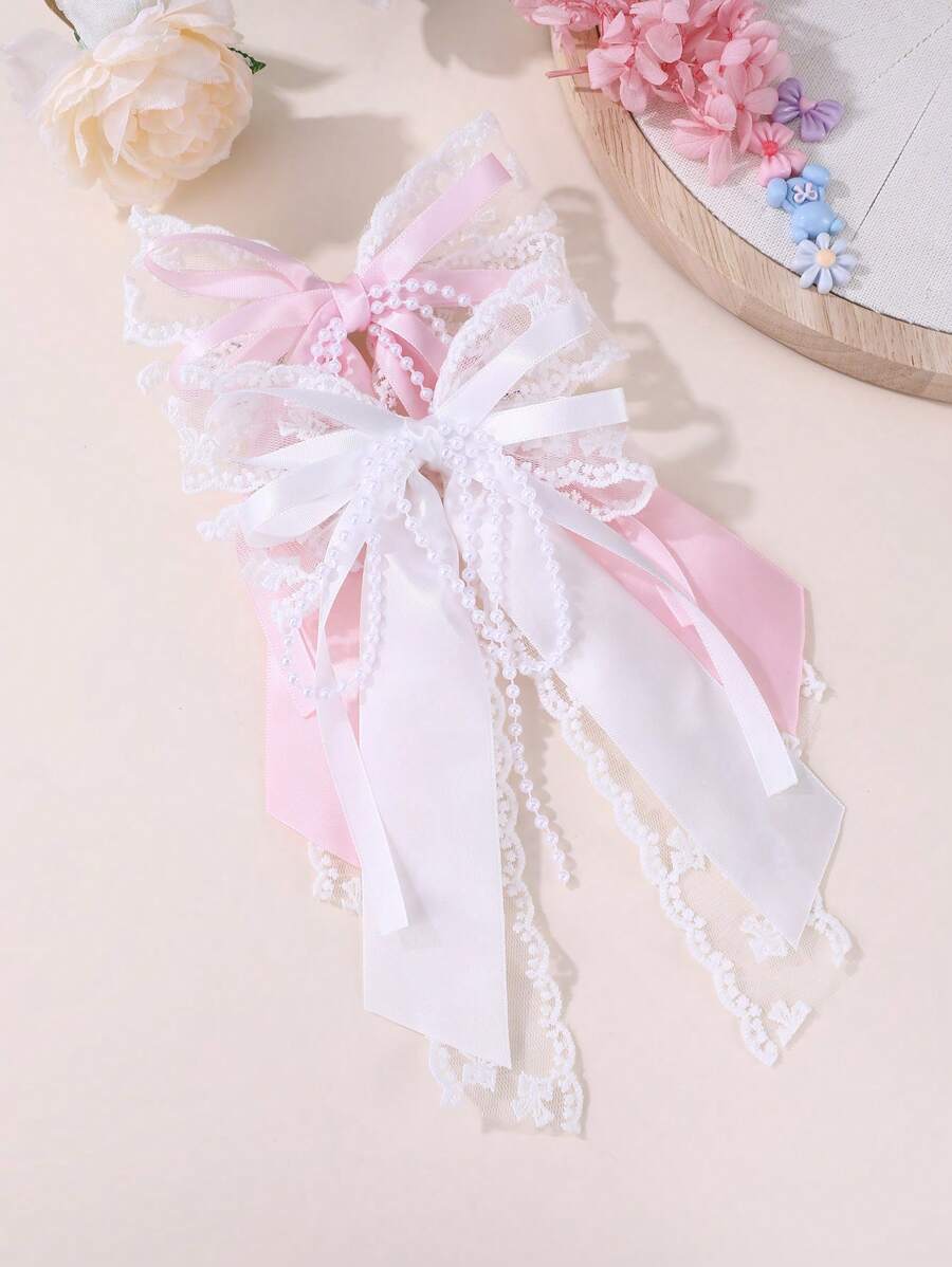 1 件女孩用丝带和珍珠蝴蝶结发夹爪 - 彩色 - 查看 1