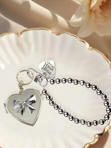 Electroplated Silver Bow Mirror Keychain, With Pearl Lanyard Heart Pendant, Silver Bow And Heart-Shaped Mirror, Retro Y2K Style Bag Charm Keychain, Fashion Accessory, Cute Multifunctional Keychain, Packaging Decoration Keychain, Small Gift, Freely Detachable, Suitable For Women Birthday And Valentine's Day Gifts