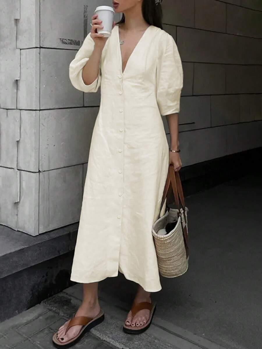 فستان طويل بأكمام منتفخة ذو لون واحد فضفاض لوحيد الصدر، متسى الظهر وذو رقبة على شكل حرف V ، بأسلوب إجازة فرنسي عصري مناسب للربيع والصيف