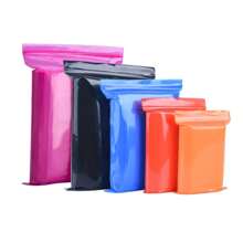 100 个塑料可重复使用拉链袋，迷你小中号口袋，红色蓝色黑色橙色珠宝包装袋，厚实耐用的聚乙烯袋，带可重新密封的拉链顶部锁，适用于旅行、储存、包装和运输 - 彩色 - 查看 4