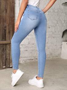 Pantalones de mezclilla ajustados, lavados en azul, estilo casual con cierre de cremallera y botón, para mujer. Jeans de mezclilla y ropa - Celeste - Ver 3