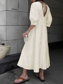 فستان طويل بأكمام منتفخة ذو لون واحد فضفاض لوحيد الصدر، متسى الظهر وذو رقبة على شكل حرف V ، بأسلوب إجازة فرنسي عصري مناسب للربيع والصيف