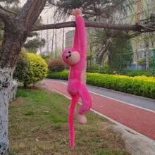 Macaco Pelúcia Com Som E Luz De Pendurar Antialérgico Grita Brinquedo Divertido