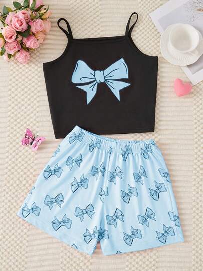A Set Of Elegant, Fashionable, And Casual Home Clothes, Paired With A Bow Black Vest And Pink Shorts, A Cute Bow Pajama Set, Suitable For Children And Girls To Wear At Home In Summer