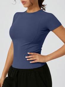 Camiseta deportiva de mujer de cuello redondo de secado rápido, ajuste ceñido con efecto estilizante, transpirable, para actividades al aire libre y fitness de manga corta