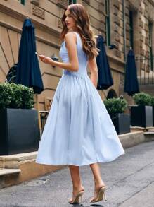 Vestido de mujer de unicolor sin mangas, con moda de botones y parches a la cintura baja