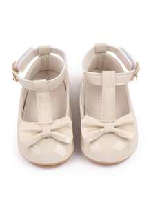 أحذية بنفلات لطفلة باللون المشمشي، أحذية أميرة للفتيات، جلدية مزينة بفيونكة ، قاعدة لينة مقاومة للانزلاق، أحذية مشي لحديثي الولادة