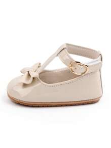 أحذية بنفلات لطفلة باللون المشمشي، أحذية أميرة للفتيات، جلدية مزينة بفيونكة ، قاعدة لينة مقاومة للانزلاق، أحذية مشي لحديثي الولادة