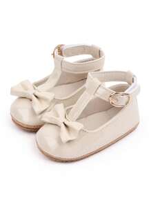 أحذية بنفلات لطفلة باللون المشمشي، أحذية أميرة للفتيات، جلدية مزينة بفيونكة ، قاعدة لينة مقاومة للانزلاق، أحذية مشي لحديثي الولادة