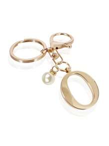 这款高级优雅的金色字母钥匙扣，A-Z 3D字母吊坠，时尚合金材质，饰以珍珠，可作包包、背包、汽车钥匙链，是女士的完美配饰，也是情侣的绝佳礼物。经典简约的钥匙扣，既可作装饰品，也可作包包配饰，适合赠送给朋友、家人、情侣、女友，也是一份重要的礼物和节日纪念品。 - 金色 - 查看 17