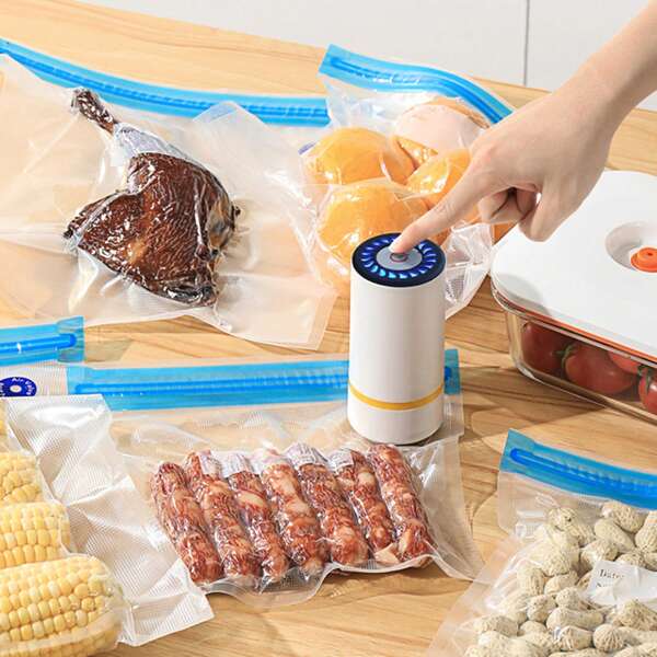 RAF Máquina de vacío, bolsa de almacenamiento al vacío, adecuada para suministros de viaje, ropa, ropa de cama, mantas y otras bolsas de almacenamiento al vacío convenientes, juego de máquina de vacío + bolsa de compresión al vacío, muy adecuado para el uso de almacenamiento en el hogar y viajes de máquinas de vacío y bolsas de vacío. Capacidad de la batería: 400mAh