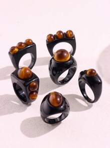 Bague large asymétrique en résine noire avec un motif géométrique de faux œil de tigre rétro. Bijou empilable de mode européenne et américaine pour femme. Excellent cadeau pour les amis.
