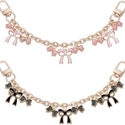 1/2 pezzi Charm a catena con fiocco nero e rosa, sostituto della tracolla per borse, catena allungatore in lega con charms smalto a fiocco rosa, accessorio decorativo per portafogli e borse