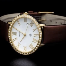 Orient FUNEK005W0 Ladies Watch: Elegant White Dial With Gold-Plated Hands And Roman Numerals