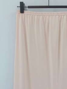 女士优雅半身裙，配有松紧腰带和衬里，可作为衬裙或单独穿着，用途广泛