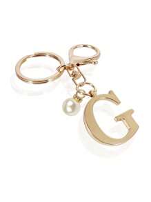 这款高级优雅的金色字母钥匙扣，A-Z 3D字母吊坠，时尚合金材质，饰以珍珠，可作包包、背包、汽车钥匙链，是女士的完美配饰，也是情侣的绝佳礼物。经典简约的钥匙扣，既可作装饰品，也可作包包配饰，适合赠送给朋友、家人、情侣、女友，也是一份重要的礼物和节日纪念品。 - 金色 - 查看 22