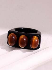 Bague large asymétrique en résine noire avec un motif géométrique de faux œil de tigre rétro. Bijou empilable de mode européenne et américaine pour femme. Excellent cadeau pour les amis.