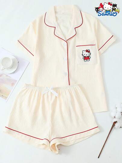 Sanrio Set de 2 piezas oficialmente con licencia Sanrio Hello Kitty con Top de manga corta con botones y bordado floral y pantalones cortos con mariposas para pijama, apropiado para uso en casa en primavera/verano
