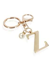 这款高级优雅的金色字母钥匙扣，A-Z 3D字母吊坠，时尚合金材质，饰以珍珠，可作包包、背包、汽车钥匙链，是女士的完美配饰，也是情侣的绝佳礼物。经典简约的钥匙扣，既可作装饰品，也可作包包配饰，适合赠送给朋友、家人、情侣、女友，也是一份重要的礼物和节日纪念品。 - 金色 - 查看 18