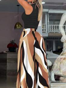 Conjunto de dos piezas de estilo casual de vacaciones, con top de punto de cuello medio alto con patrón de ondas y pantalones de pierna ancha tejidos