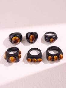 Bague large asymétrique en résine noire avec un motif géométrique de faux œil de tigre rétro. Bijou empilable de mode européenne et américaine pour femme. Excellent cadeau pour les amis.