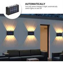 1/2/4/6 piezas Luces solares de pared de 10 LED, iluminación hacia arriba y hacia abajo para ambiente en exteriores, patio, jardín, sendero, decoración de pared