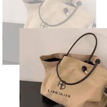 Nuevo bolso de hombro informal de trabajo de estilo europeo y americano con estampado de letras, bolso de mano grande, bolso de compras versátil de gran capacidad. Nuevo bolso de hombro informal de trabajo de estilo europeo y americano con estampado de letras, bolso de mano grande, bolso de compras versátil de gran capacidad.
