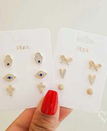 TRIO DE BRINCOS MIA OLHO GREGO MÃO HAMSA E CRUZ FOLHEADO A OURO 18K