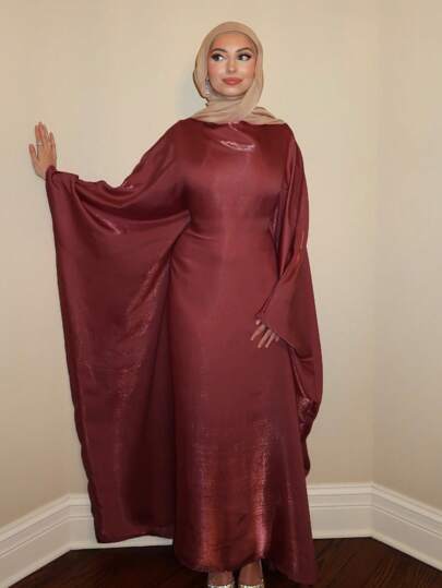 1 st. damklänning med åtsittande midja och fjärilsmönster, böljande maxiklänning i satin med pärlemormotiv, smickrande figursydd silhuett, voluminösa biskopsärmar, elegant enfärgad abaya lämplig för vardag, evenemang, festivaler, blygsam