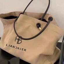Nuevo bolso de hombro informal de trabajo de estilo europeo y americano con estampado de letras, bolso de mano grande, bolso de compras versátil de gran capacidad. Nuevo bolso de hombro informal de trabajo de estilo europeo y americano con estampado de letras, bolso de mano grande, bolso de compras versátil de gran capacidad.