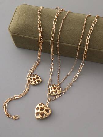 1 件青少年珠宝套装，精致空心心形，不对称几何项链，编织手链，时尚、高端，适合服装、学校、乡村、街道、派对、生日礼物、圣诞礼物。保持产品质量，建议在沐浴时取下，否则可正常佩戴。