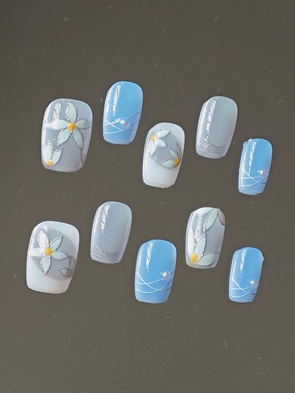 10Pcs Handmade Oval Press-On Nail Art Nails, Interwoven In Light Blue And Pale Gray, Resembling The Rolling And Unfolding Of Clouds. Delicate Flowers Are Dotted On Them, Twinkling Like Stars, Removable And Reusable, Suitable For Women Of Different Styles For Daily Use.