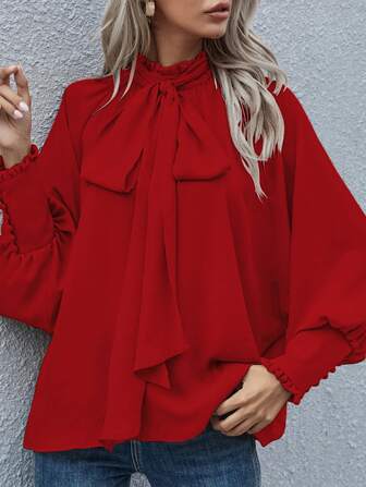 纯色宽松纽扣蝴蝶结衬衫，大码灯笼长袖，适合欧美女士外出通勤办公穿着。