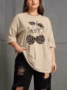 Blusa estiva casual ampia con stampa leopardata e ciliegie in stile streetwear, maglietta ampia in CVC taglie comode per donne, maglietta ampia e comoda a maniche corte in taglie comode per attività sportive, blusa estiva ampia color cachi in taglie comode per donne, maglietta estiva ampia in taglie comode per donne