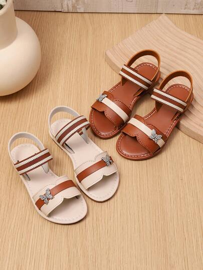 1 par de sandalias planas para niñas de talla extra, de bebé/niña pequeña, blanco y marrón de PU, con decoración de lazo de cristal brillante, de punta abierta, con correa elástica, sandalias de estilo romano de princesa linda, adecuadas para niñas de 3 a 15 años, uso casual diario, nueva llegada primavera/verano 2025