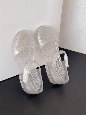 新款儿童公主鞋，纯色柔软闪亮果冻凉鞋，休闲包头女童鞋，适合海滩度假，夏季