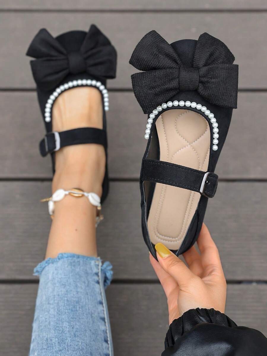 女士黑色蝴蝶结圆头一脚蹬珍珠装饰鞋，舒适百搭奶奶平底鞋
