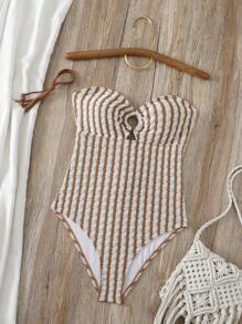 Nuevo traje de baño de una pieza con un solo hombro, tela especial y accesorio circular, elegante y conservador, para fiestas de playa y piscina para mujeres