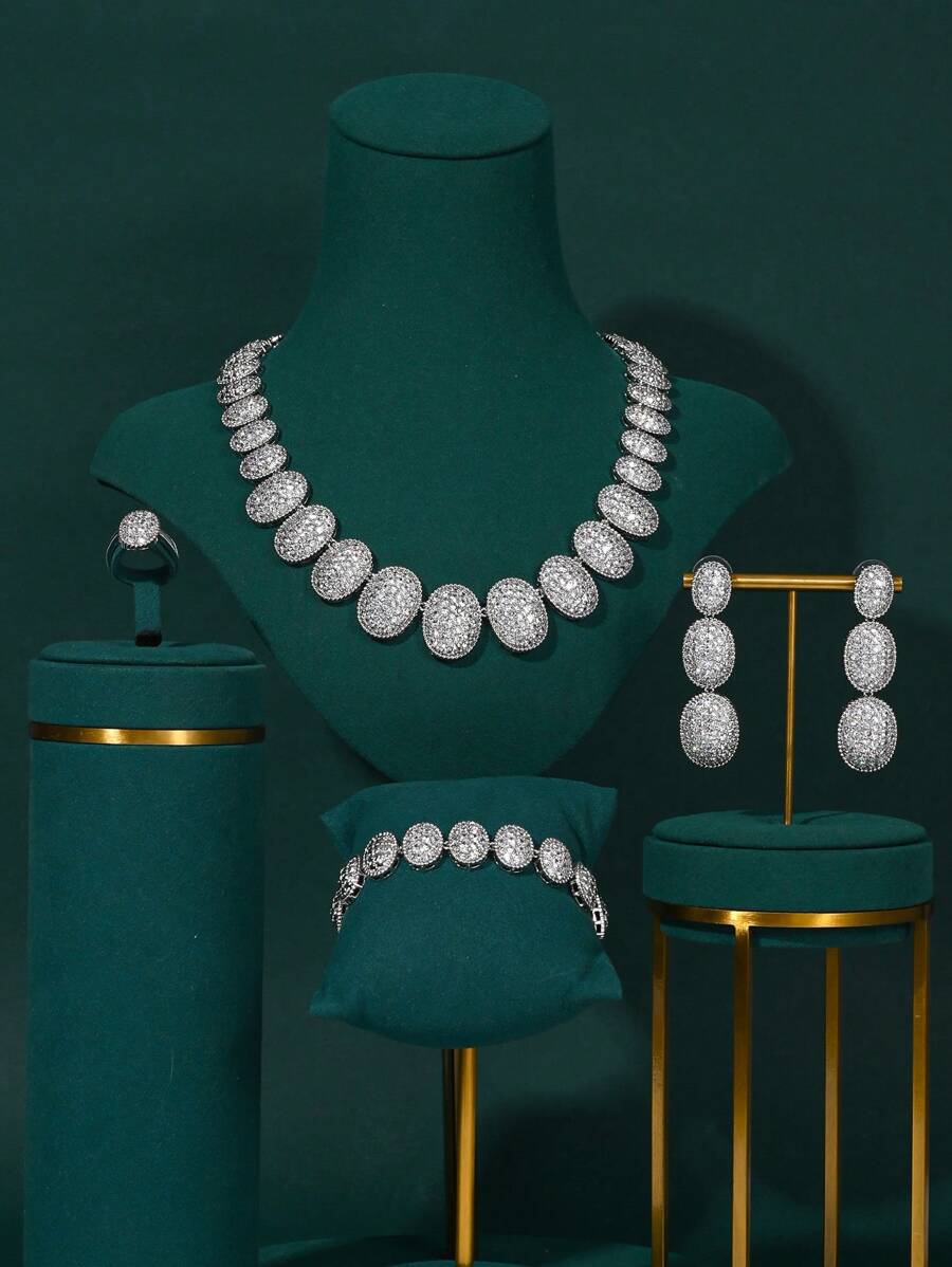 4 pièces/Set Ensemble de bijoux feuille en zirconium à la mode, collier, bracelet, boucles d'oreilles, bague. Convient pour le port quotidien des femmes, les fêtes. Ensemble cadeau de luxe pour petite amie/épouse pour la Saint-Valentin