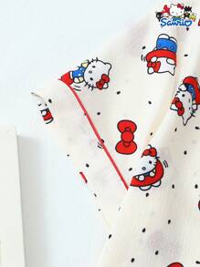 Set de 2 piezas de pijama con parte superior de manga corta con botones y bolsillo estampada con Hello Kitty de Sanrio, y shorts con lazo, adecuado para uso casual en casa, primavera/verano